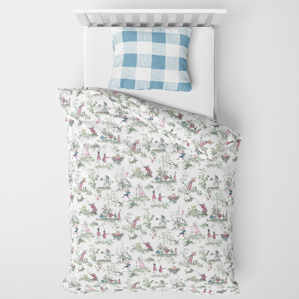 a neatly made bed with a white mattress and a blue and white checkered pillow. The bedding features a floral pattern with various figures and scenes.