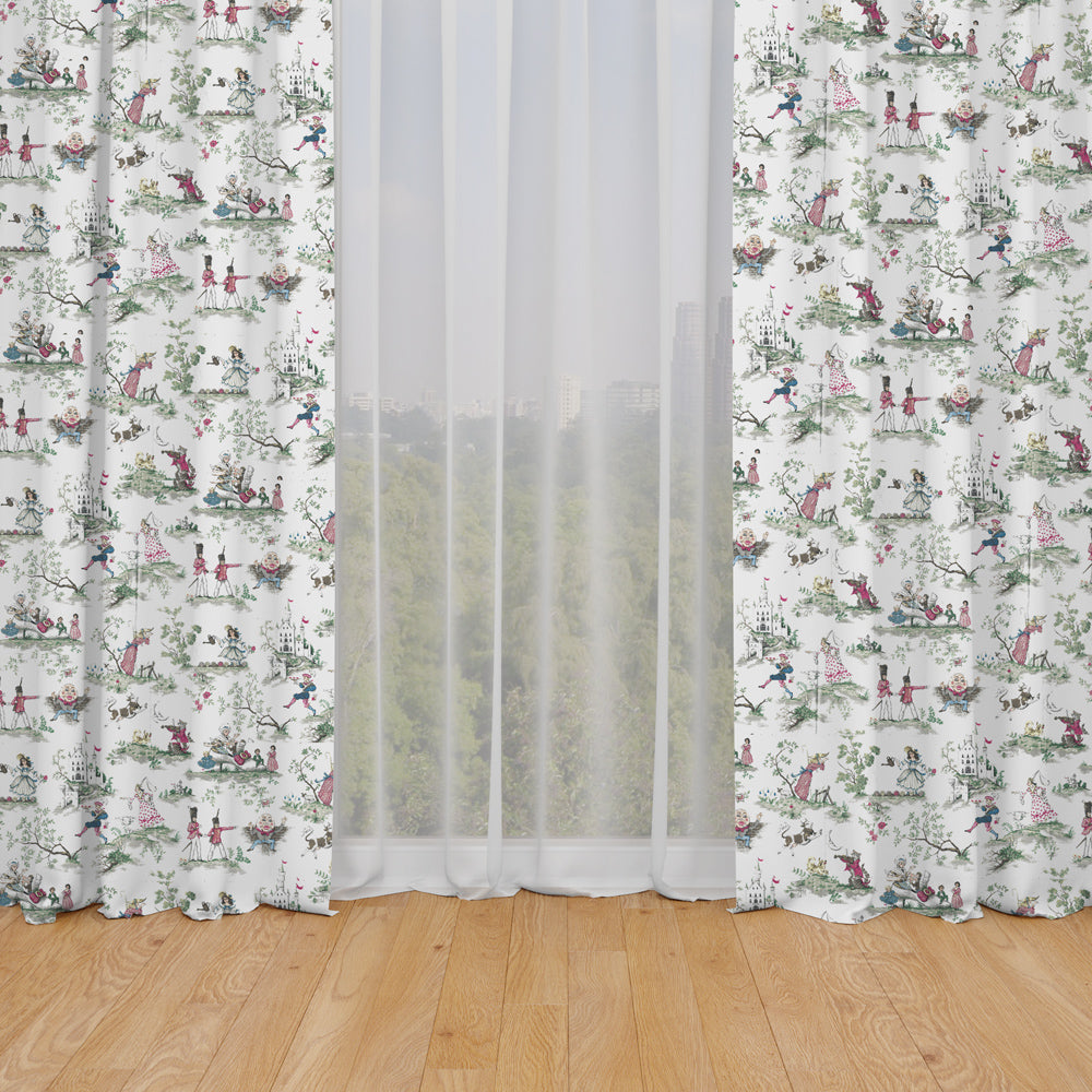 a pair of white curtains with a floral pattern, hanging in front of a window with a view of trees and buildings.