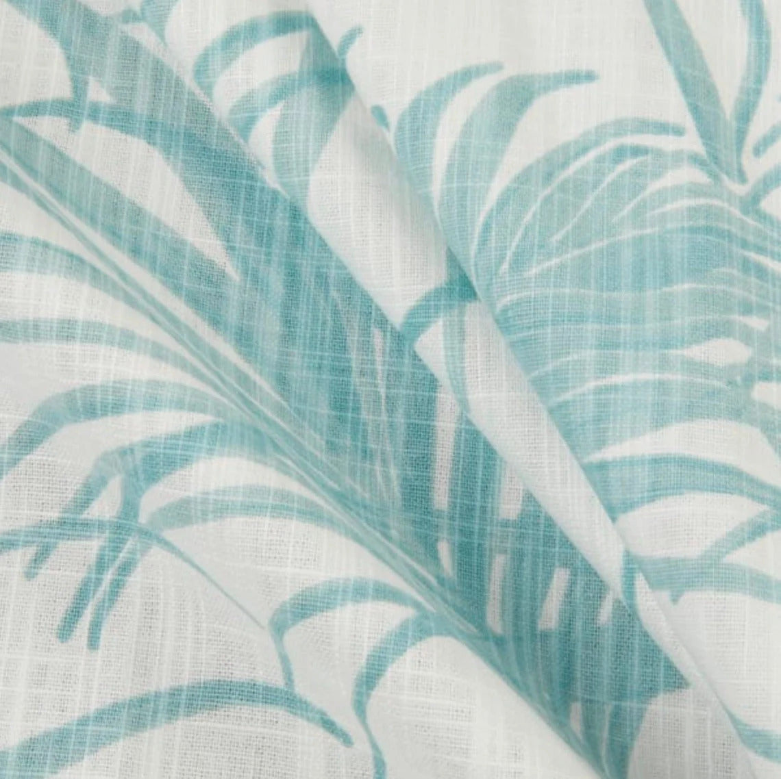 shower curtain in karoo cancun blue watercolor tropical foliage