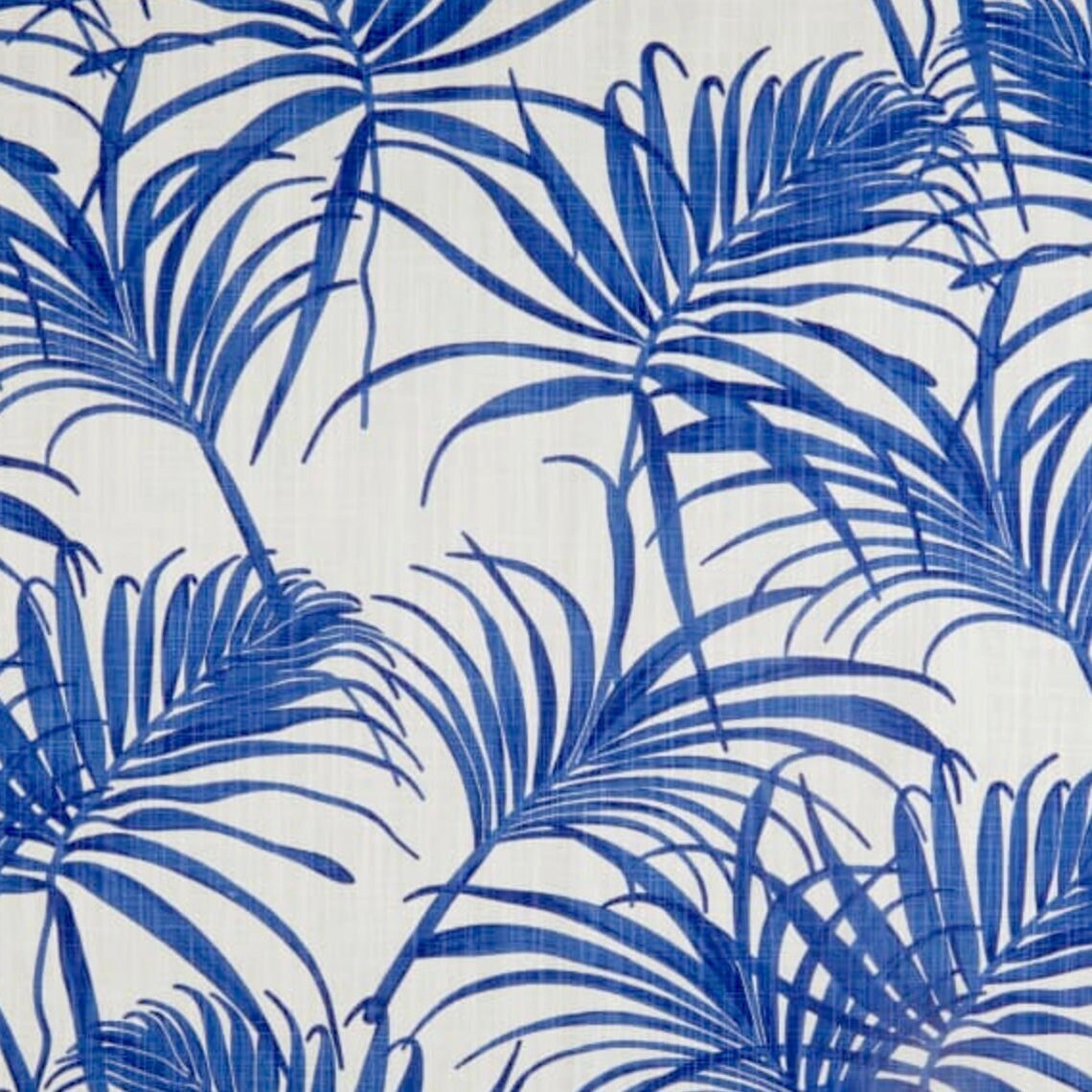 tailored bedskirt in karoo commodore blue watercolor tropical foliage